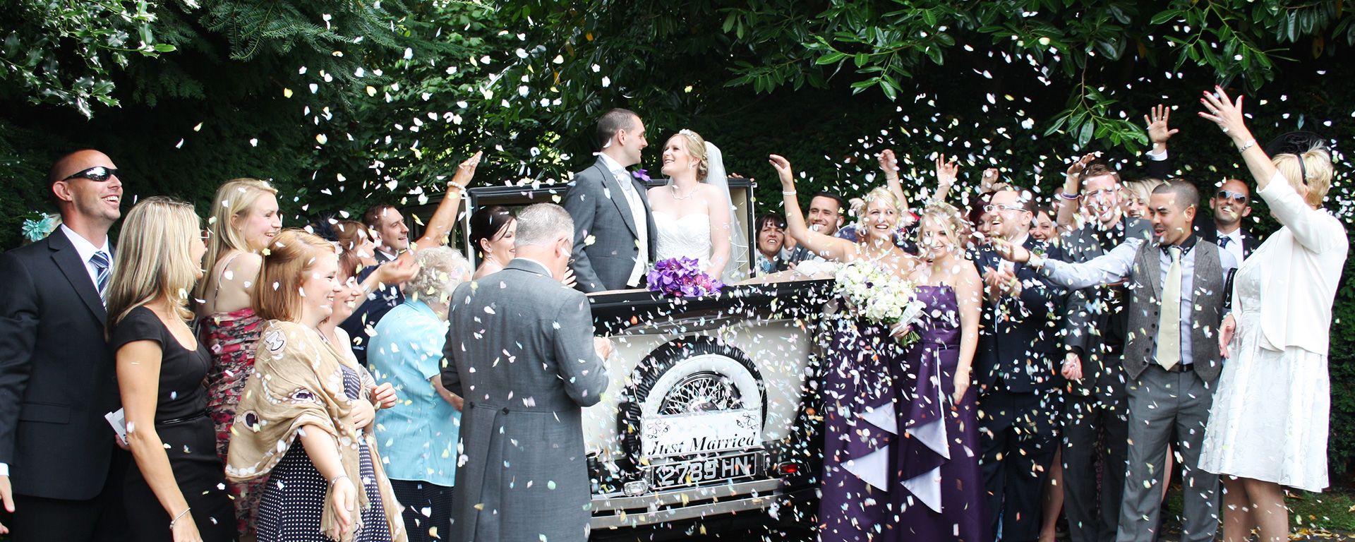 Bride and groom with confetti