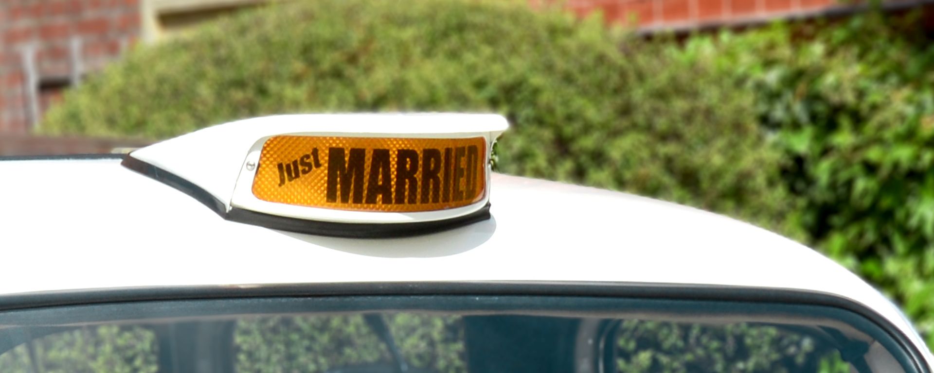 Peggy's taxi hire sign has been replaced with 'Just Married'