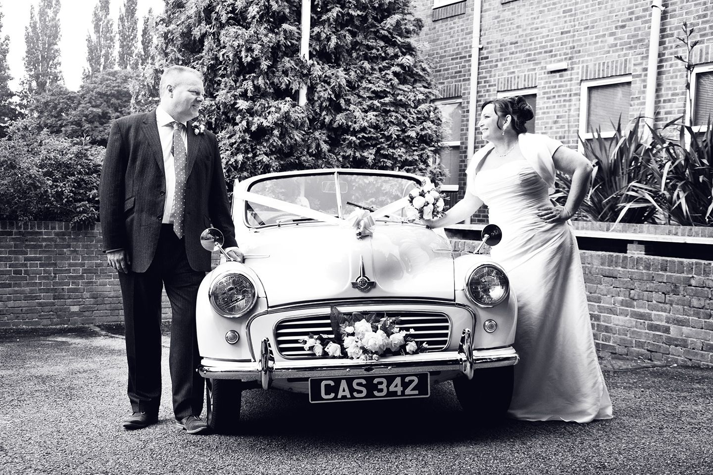 Black and white photo of happy couple with Cassie